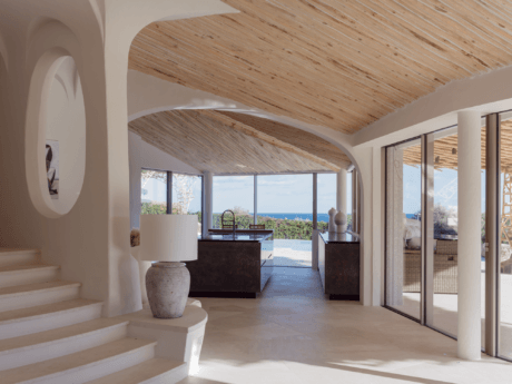Villa Ginepro: a captivating blend of nature-inspired design and personal resonance in sardinia's breathtaking landscape.