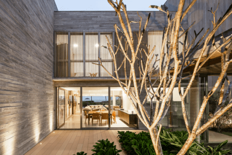 Casa Riviera by Basiches Arquitetos: a transformed beach house, fostering family unity and cherished moments on the coastline.