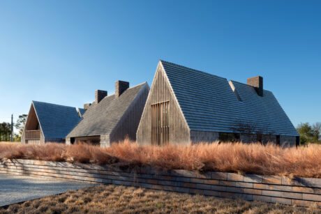 Stony Hill House by Bates Masi Architects is a modern reflection of traditional farmhouses, embracing panoramic views and timeless design.