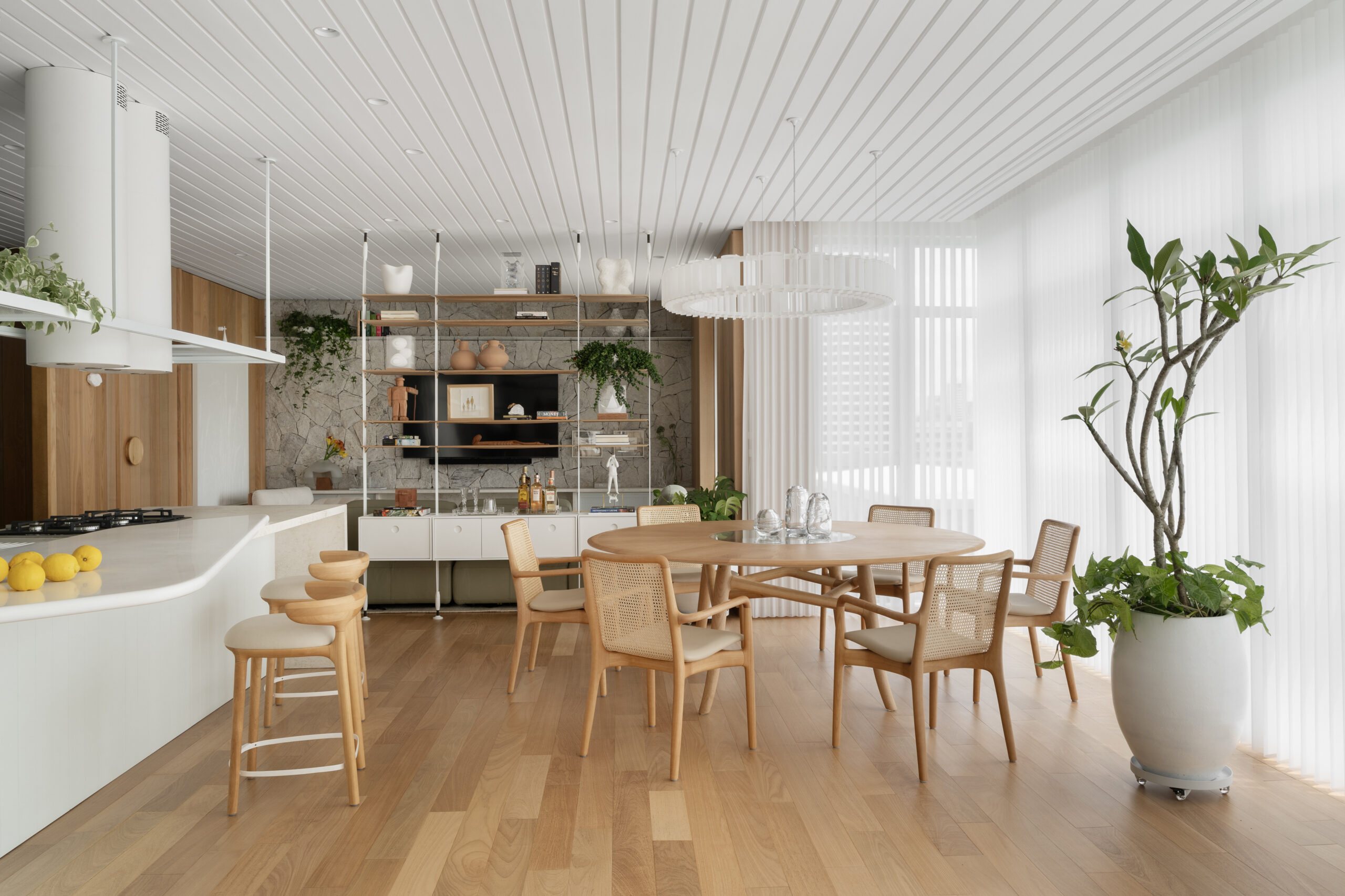 Casa Madeira exemplifies how material choices in architecture transform living spaces, blending warmth, function, and nature.