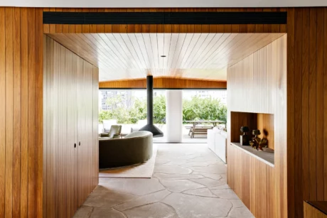 Balcony design blends privacy and openness, creating a tranquil green retreat amidst vibrant urban surroundings.