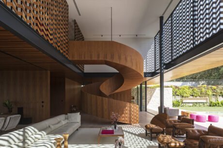 MBS House seamlessly blends indoor and outdoor living, integrating architecture with nature for a cinematic experience.