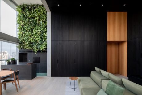 The NCC apartment harmonizes functionality and nature, blending cozy design, personal touches, and Brazilian handicrafts.